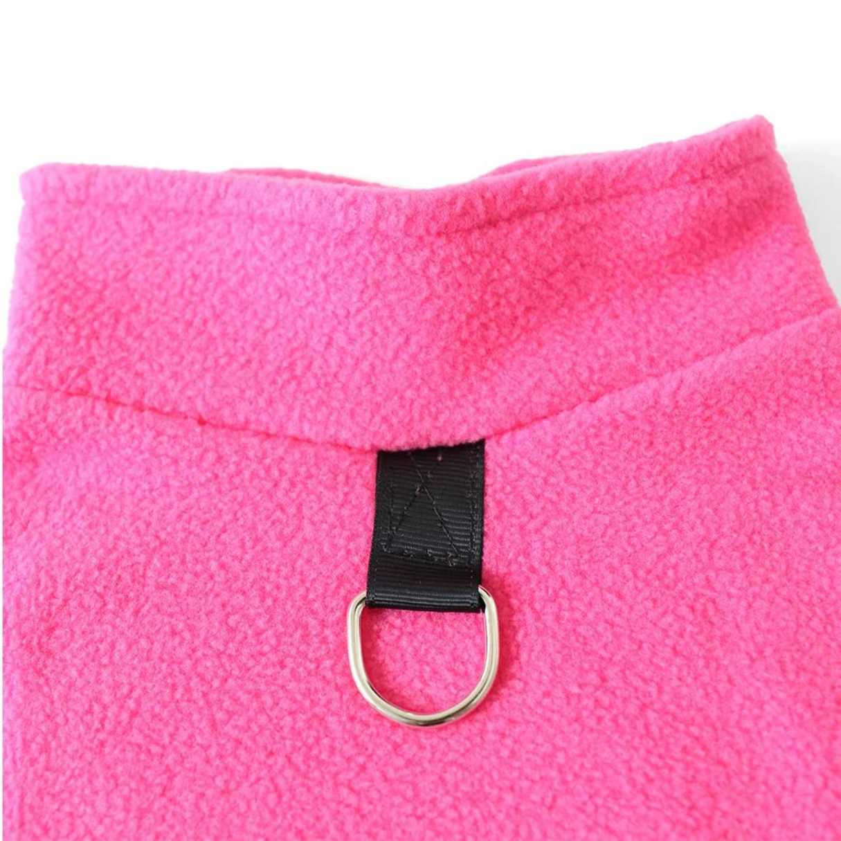 Close up pink barkie vest dog clothing, jacket on the neck. For the lead